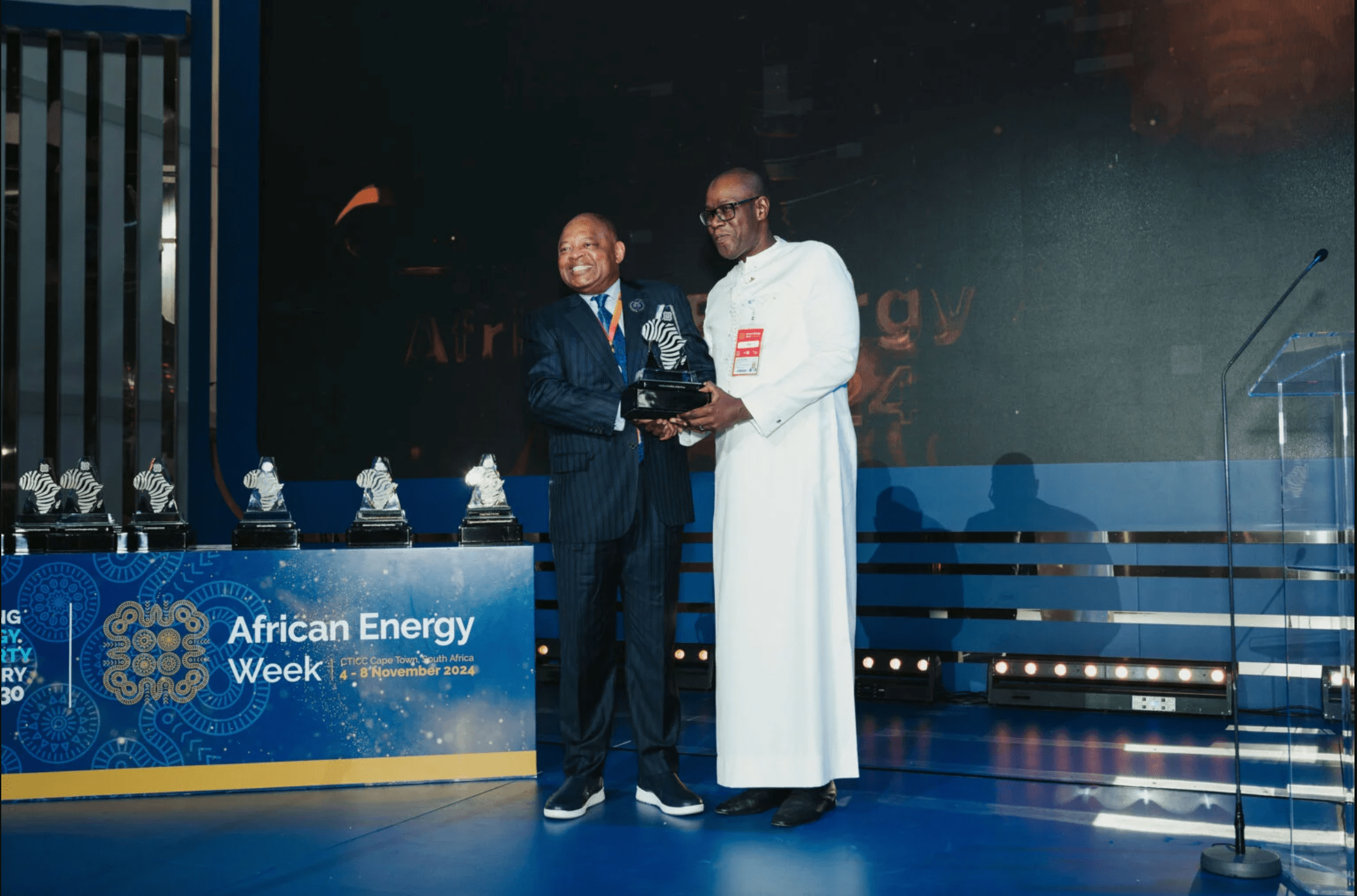 The Regional Director of AGL Senegal, Mohamed Diop, accepts an award at the Invest in African Energy 2024 Awards.