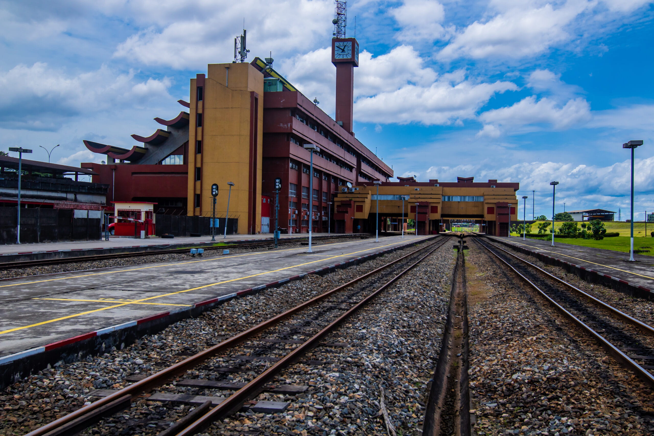 Close-up image of train tracks leading into a station.